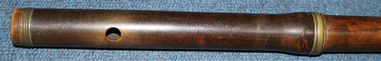 An early 19th century brass mounted concert flute, 23.75in.